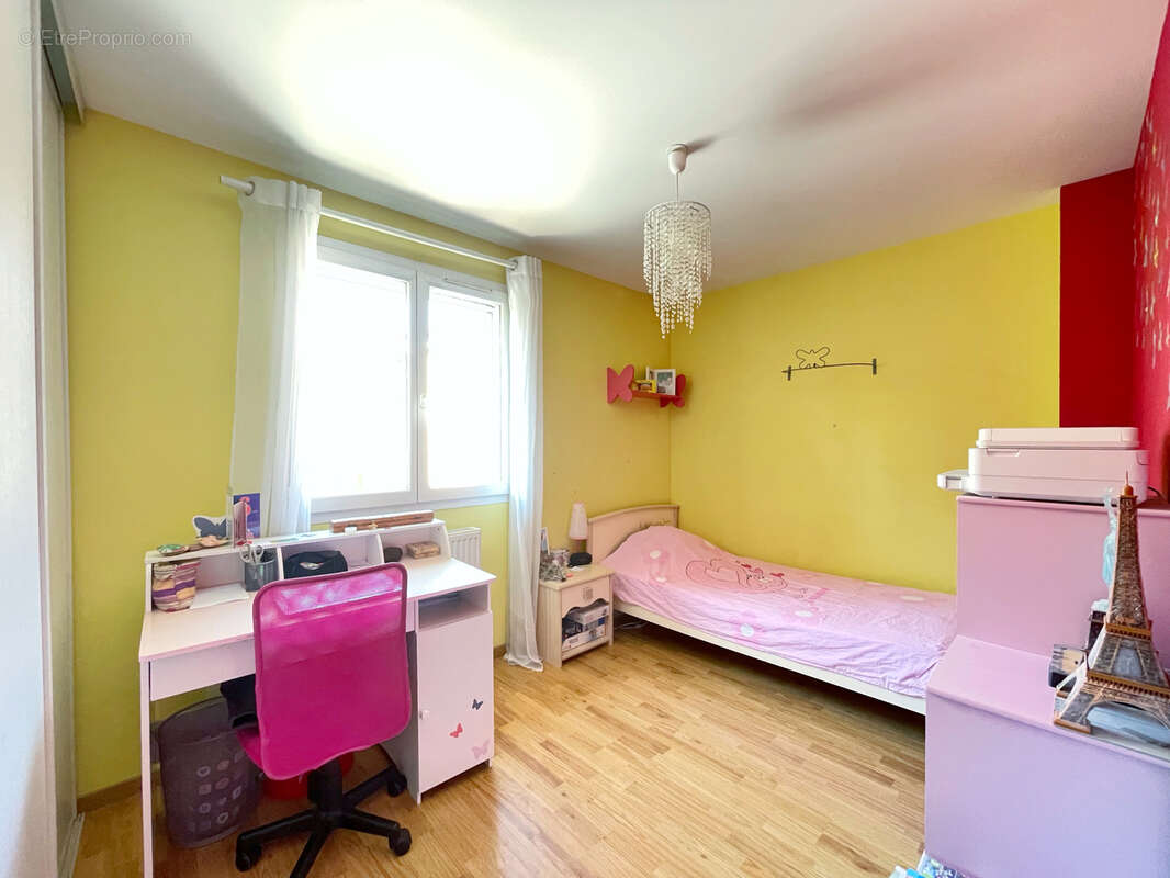 Maison familiale avec jardin dans un secteur recherché d'Irigny-le-Haut - photo 11