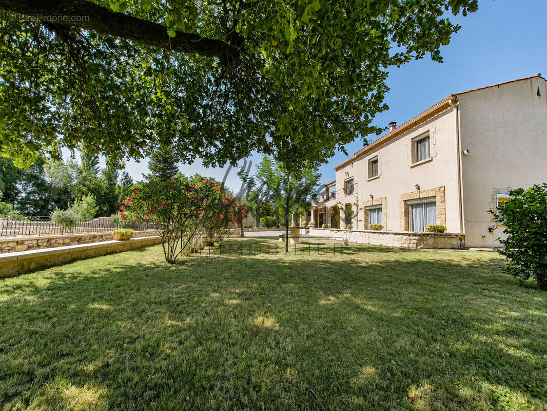 A proximité d'Uzès, très belle Propriété provençale de 240m2 sur 6000m2 de jardin méditéranéen - photo 6