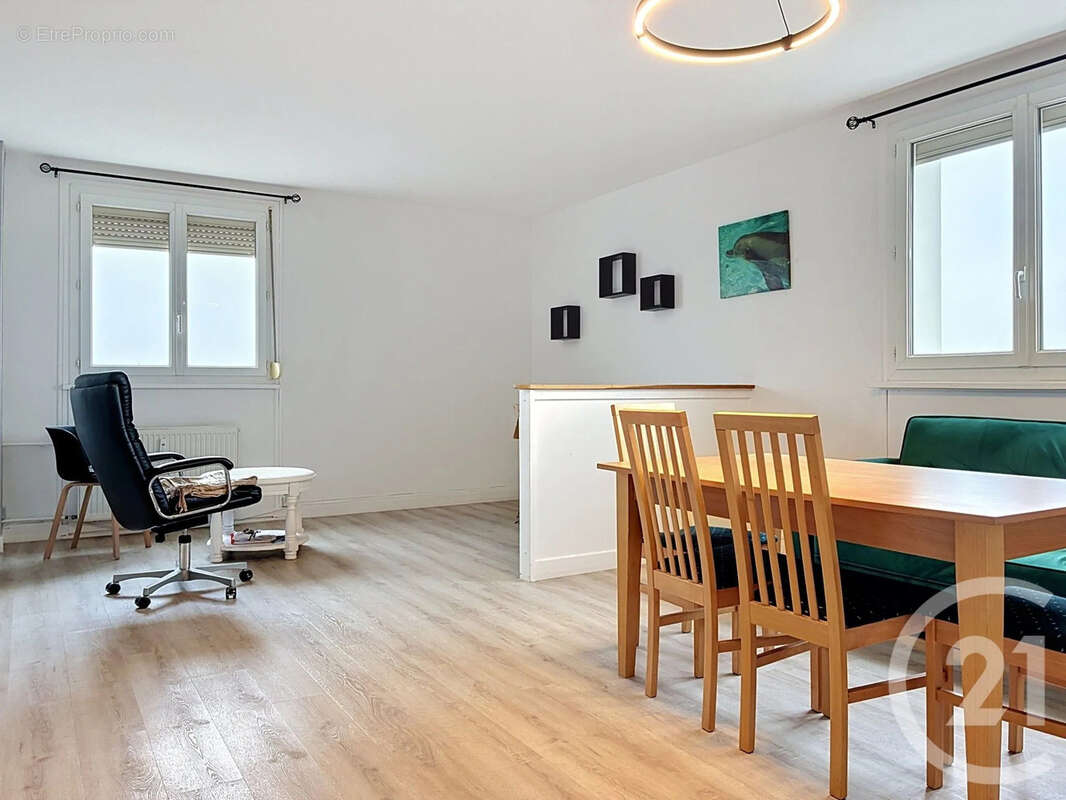 Appartement 4 pièces 68 m² à vendre à Reims (51100) - photo 2