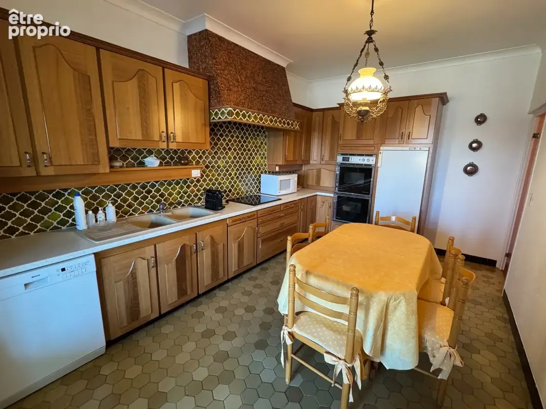  Élégante maison semi-individuelle – Centre-ville de Fourmies – 159 m² – Jardin arboré – Garage 45 m² - photo 13