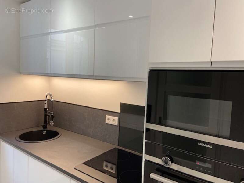 Appartement à vendre 4 pièces PARIS 10EME ARRONDISSEMENT (75) DPE en D - photo 2