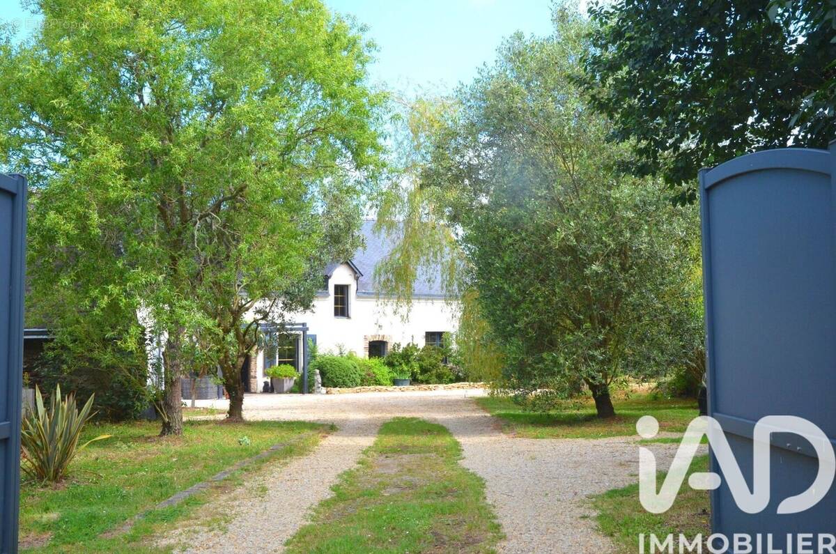 Photo 1 - Maison à LE TOUR-DU-PARC