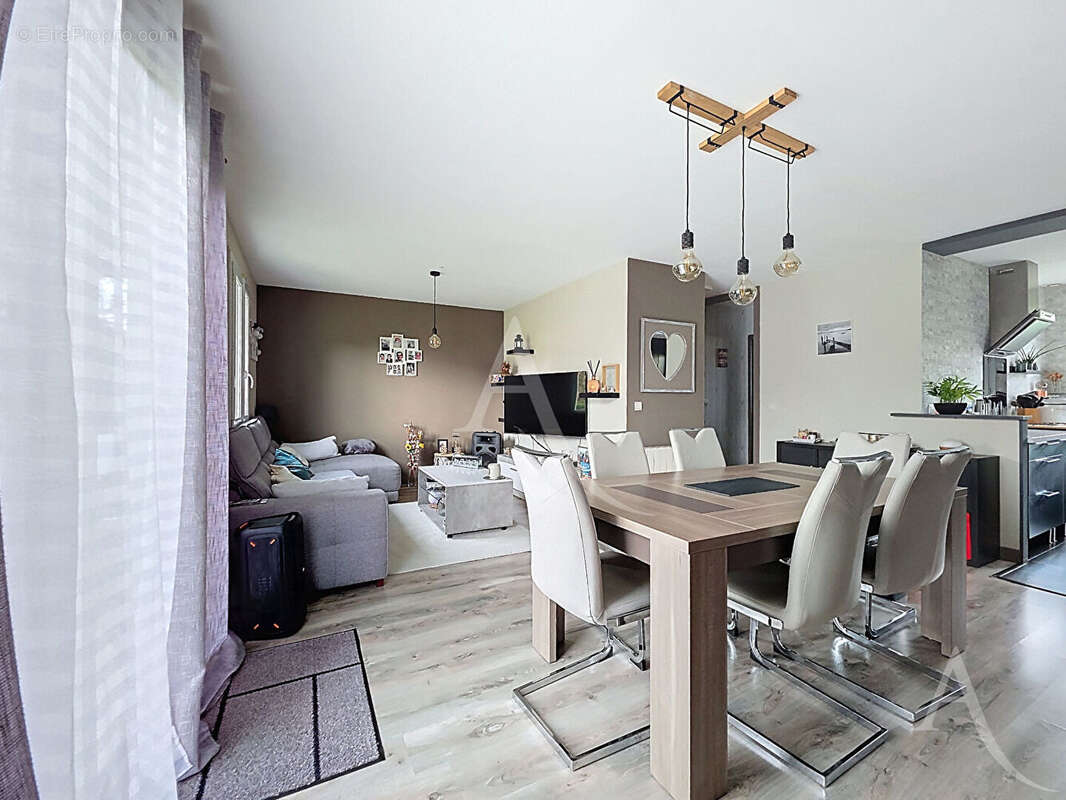 Maison de plain-pied 4 pièces avec sous-sol total et terrain de 650 m² à Rosny-sur-Seine - photo 4