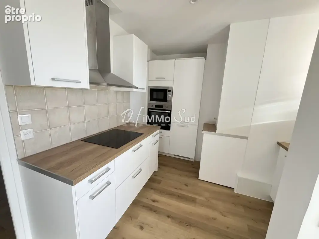 Appartement t4 de 110 m2 - ascenseur - terrasses - cellier - garage - photo 7