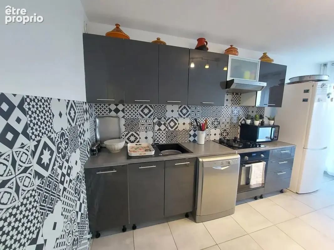 Appartement 4 pièces 82 m² à vendre à Saint-Etienne (42000) - photo 4