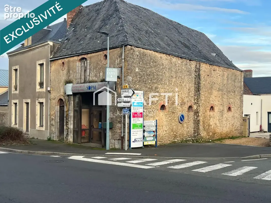 Photo 1 - Commerce à BRULON