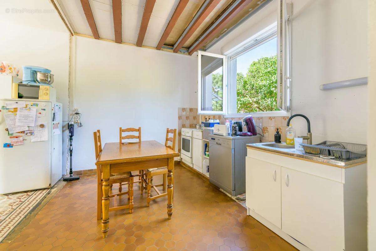 Maison de 5 pièces de 102 m² à Villechauve - photo 6