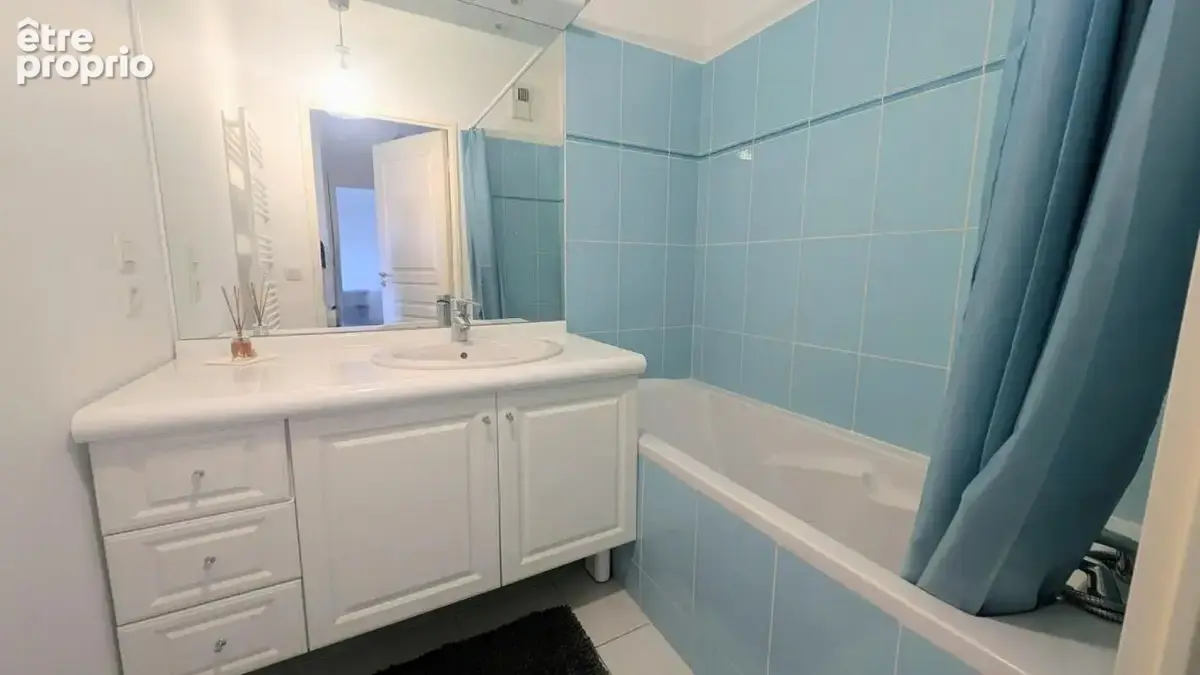 Appartement lumineux en rez-de-jardin avec place de parking - photo 6