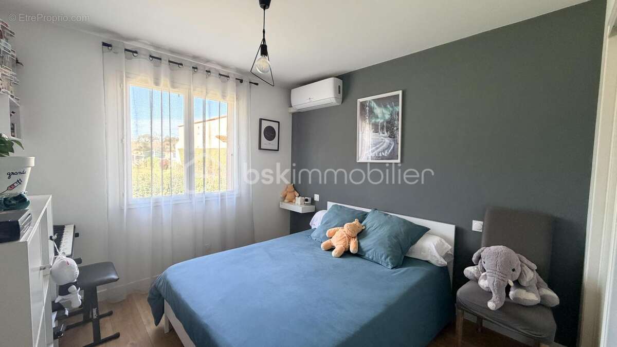 Maison plain pied quatres faces avec terrain et garage - photo 12