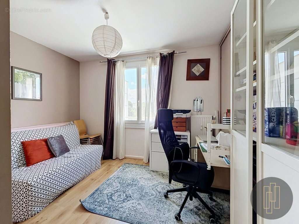 Exclusivité - Appartement 68.8 m², séjour double - 2 chambres - balcon cave et ascenseur - photo 7