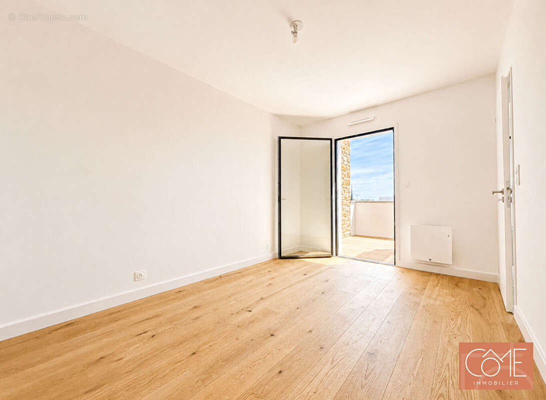 Grand type 2 48,33m² - balcon - avant dernier etage - parking sous-sol - centre-ville - saint-grégoire - photo 5