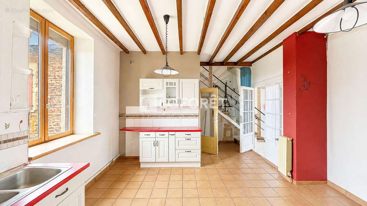 Maison à SOURCIEUX-LES-MINES