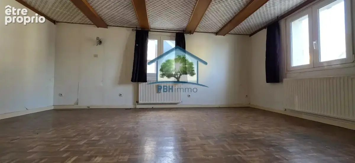 DANNEMARIE (68) - Maison mitoyenne de 7 pièces avec grande grange et terrain constructible - photo 5