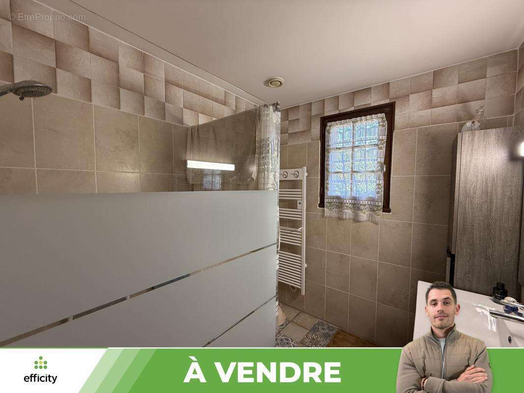 Maison 127 m² à Fontaine-Le-Comte  - photo 11