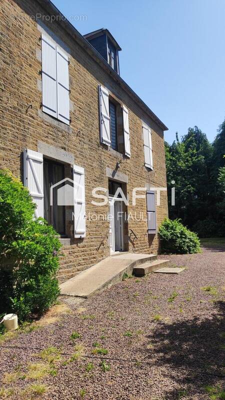 Photo 1 - Maison à CONDE-SUR-NOIREAU