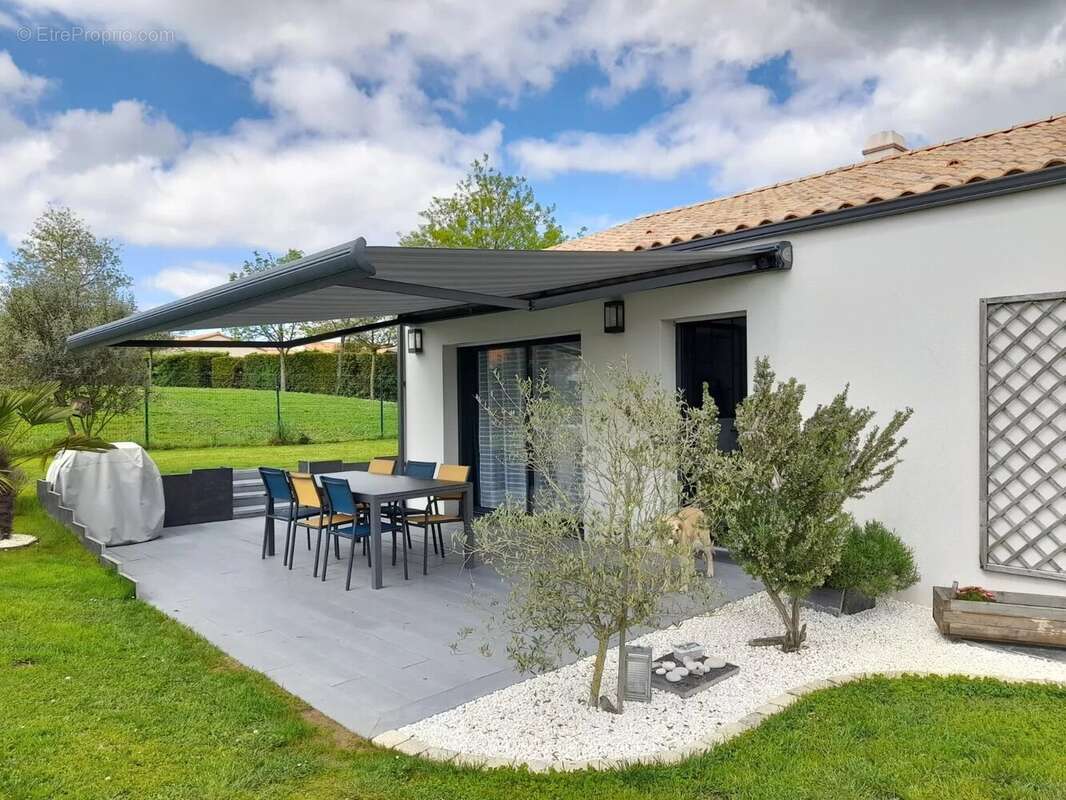 MONTBERT Plain pied 115 m2 hab. 3 chambres en parfait état - photo 4