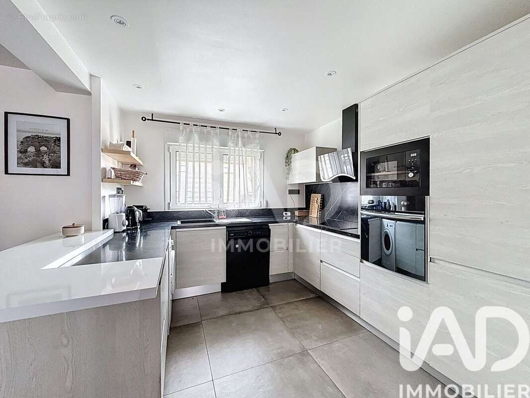 Photo 2 - Maison à PONTAULT-COMBAULT