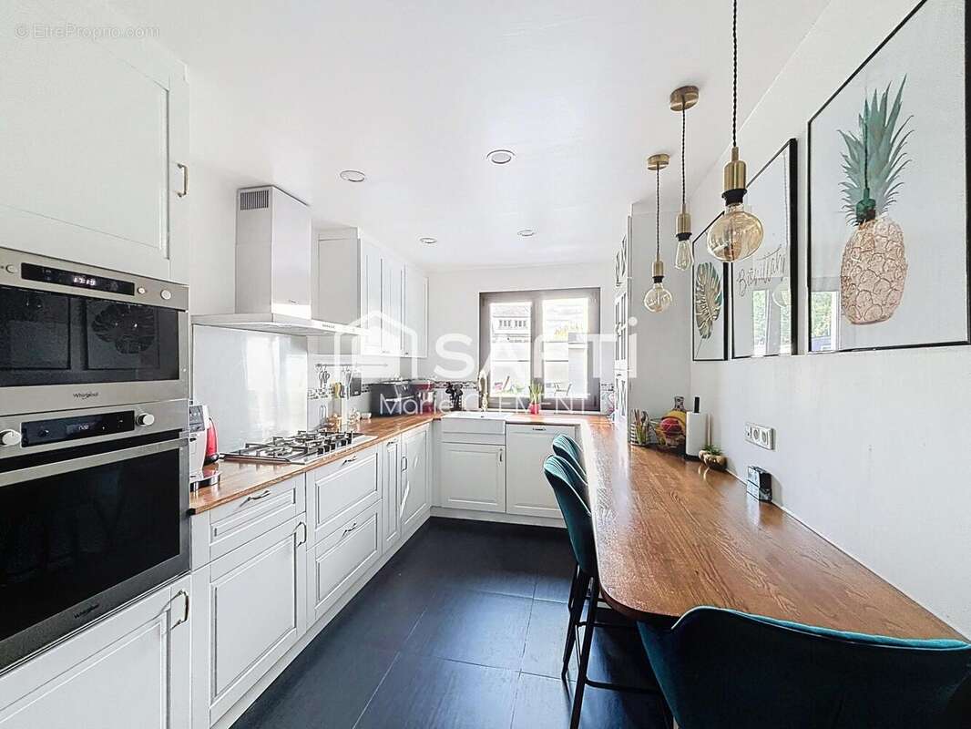 Photo 4 - Maison à PONTAULT-COMBAULT