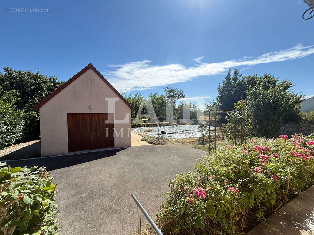 Maison familiale de 165 m² avec jardin, double garage et vie de plain-pied réf: F15552 - photo 13