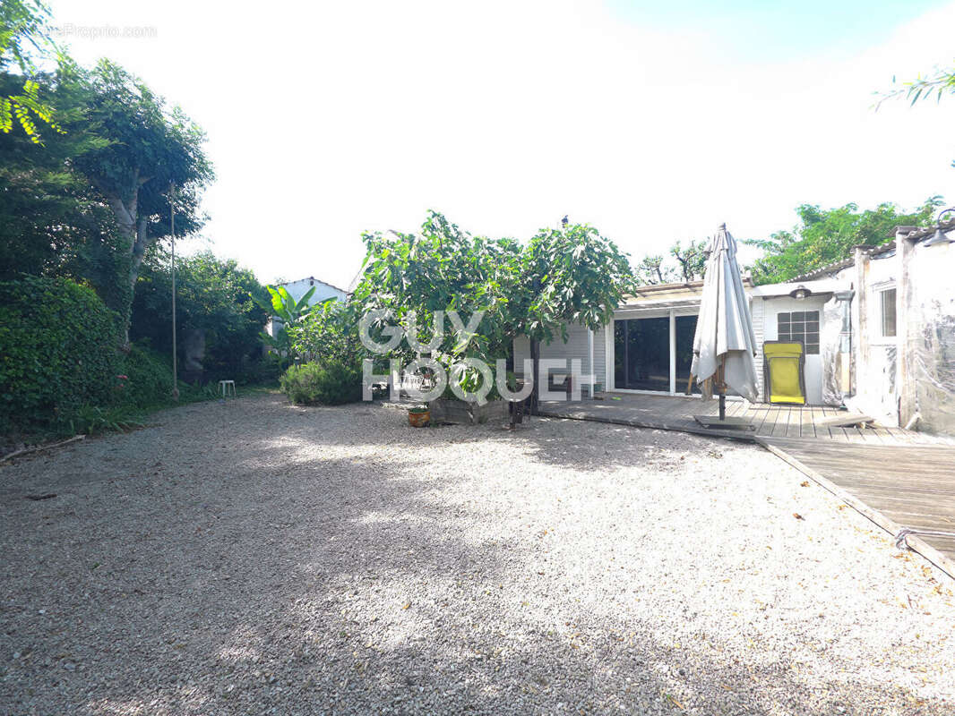 Maison de 100 m² avec beaux volumes et fort potentiel d'aménagement - photo 5