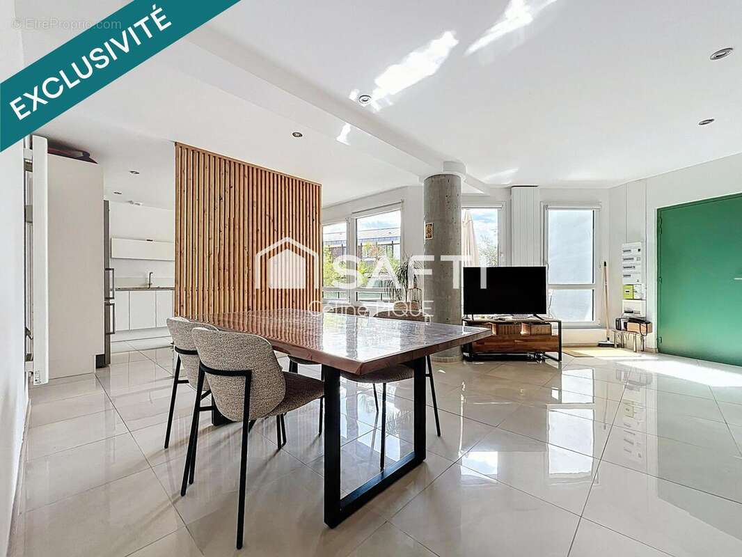 Photo 2 - Appartement à HEROUVILLE-SAINT-CLAIR