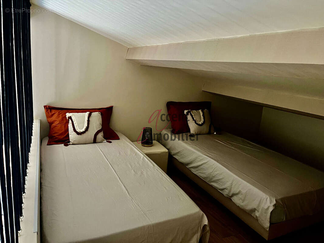 EXCLUSIVITE : Maison plain pied avec jardin T2 Bis (mezzanine) et places de parking - photo 9