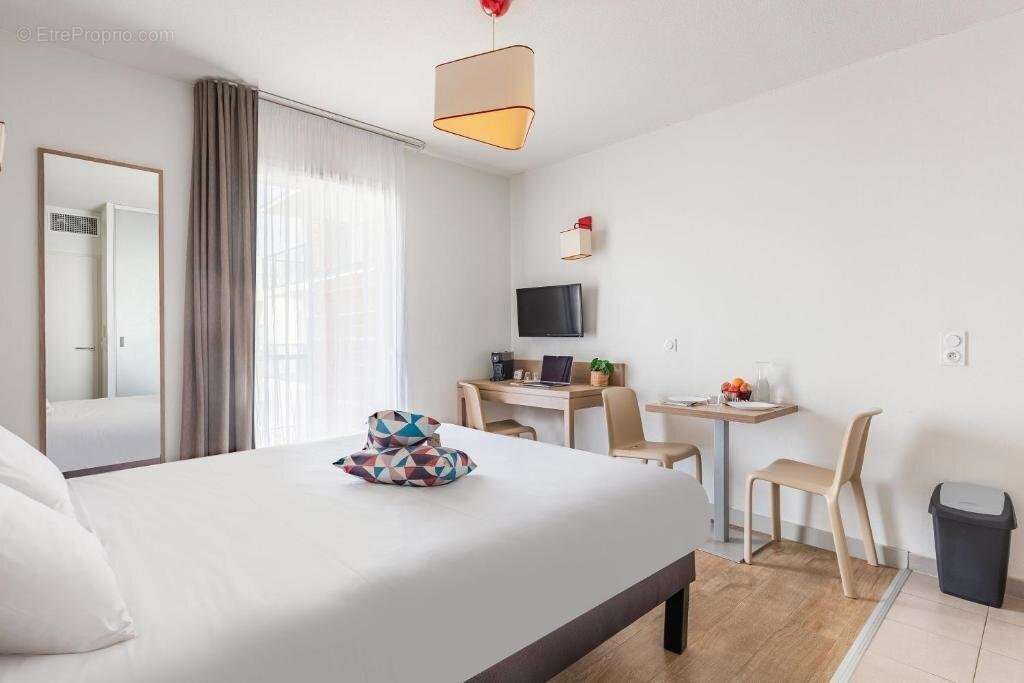 INVESTISSEMENT LOCATIF  Perpignan  Résidence de tourisme Appart'City Confort Perpignan Centre Gare - 7.24% de rentabilité - photo 3