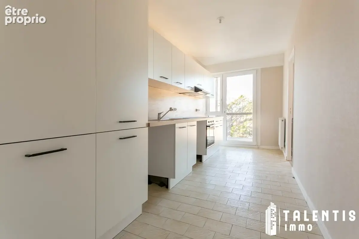 Appartement 4 pièces 80 m² à vendre à Saint-Herblain (44800) - photo 3