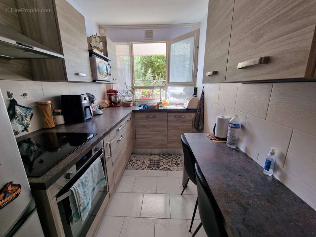 APPARTEMENT à vendre 5 pièces d'env 90 m2 VITTEL (88) avec BALCON, GARAGE, 2 CAVES - photo 5