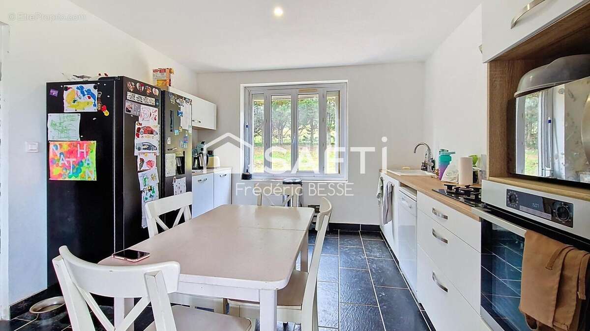 Photo 5 - Maison à LUSIGNAN-PETIT