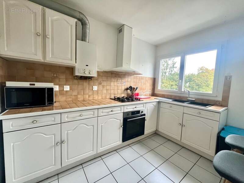 Dpt Finistère (29), à vendre QUIMPER Ouest - appartement rénové meublé T5 en collocation de 96 m² habitable - deux loggias -Cave - photo 3