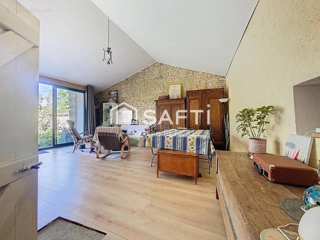 Photo 1 - Maison à BREUIL-LA-REORTE