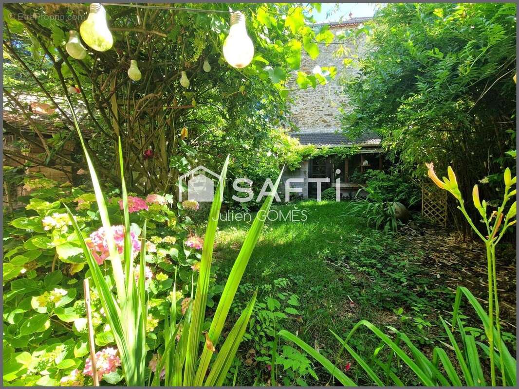 Photo 2 - Maison à MITRY-MORY