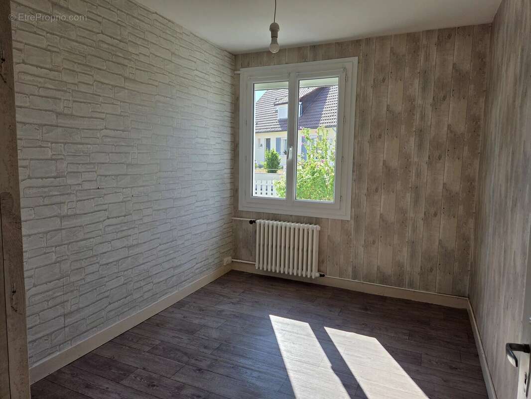 Maison avec jardin et garage quartier tranquille secteur Heuzé - St Georges - photo 9