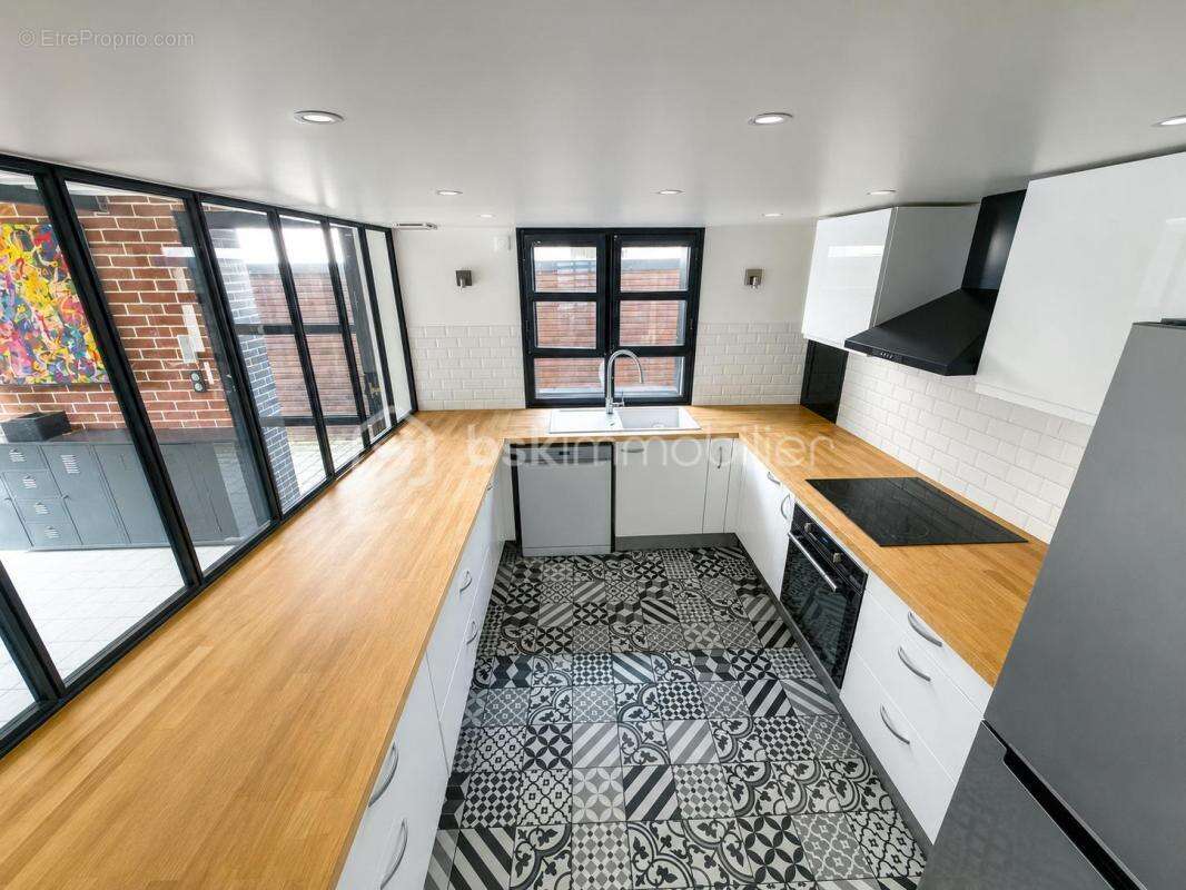 Loft d'exception de 126m2 - 3 Chambres - Charme industriel & volumes remarquables - photo 3