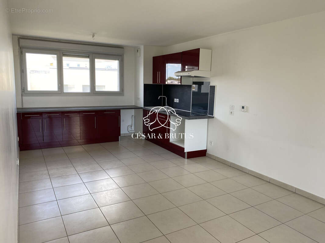 Appartement 70 m² à Saint-Priest  - photo 6