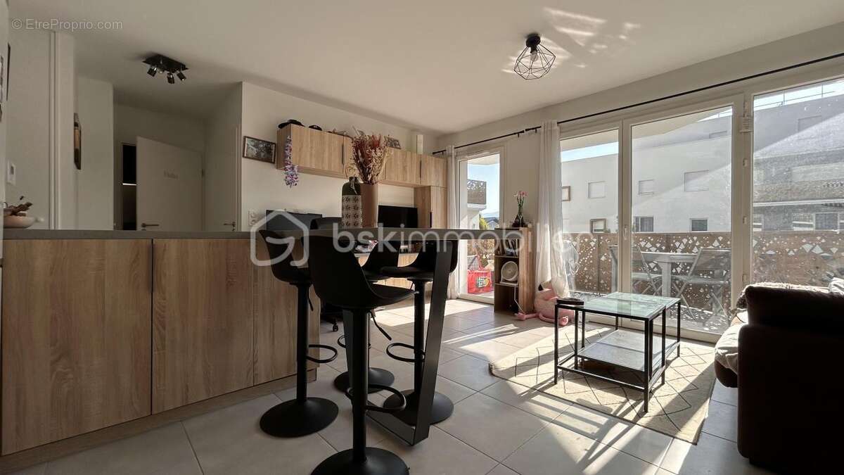 T2 récent 43 m² avec balcon 9,4 m² + parking sous-sol - photo 4