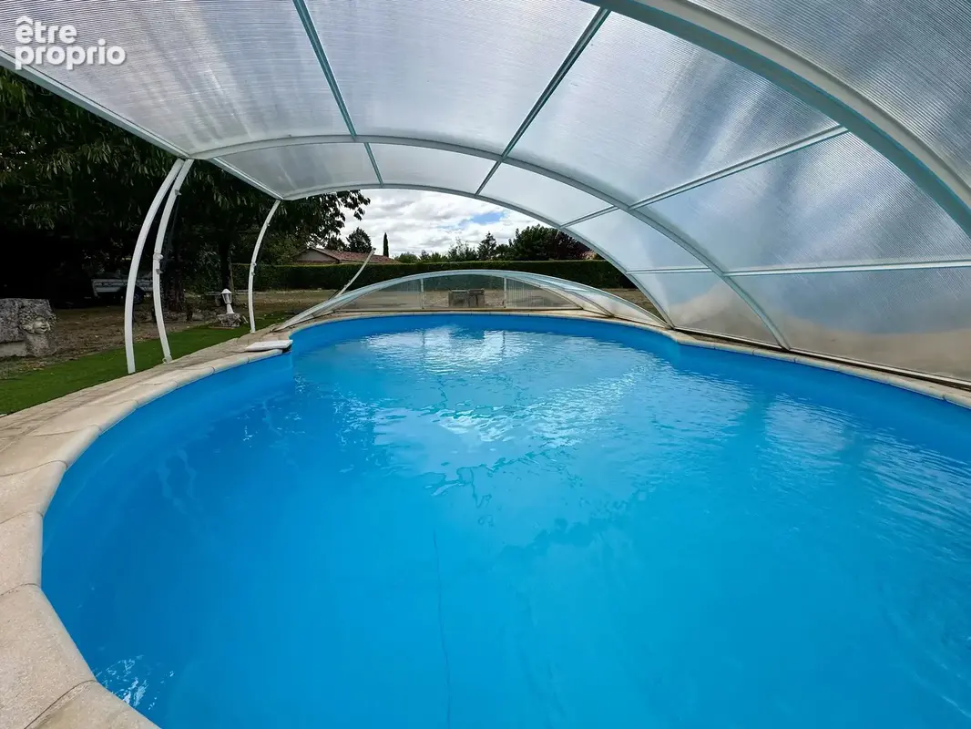 Maison familiale de plain-pied avec piscine, grand garage et potentiel d'agrandissement - photo 5