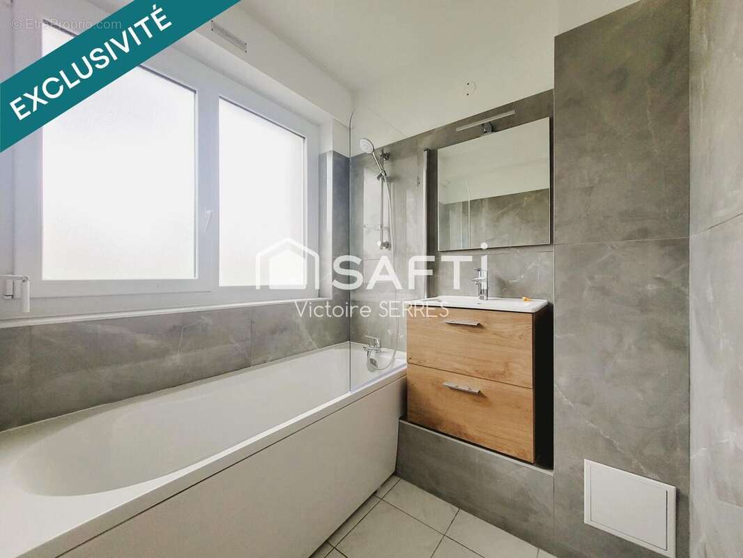 Photo 9 - Appartement à HEROUVILLE-SAINT-CLAIR