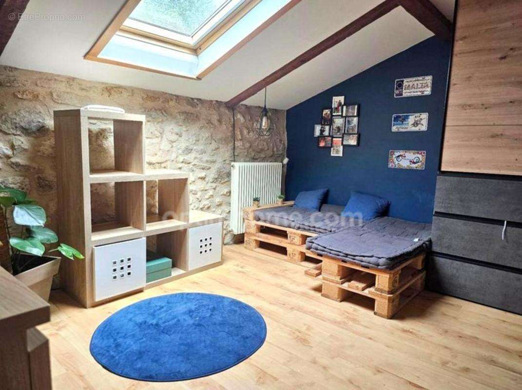 Maison en pierre atypique de 122 m² 3 chambres et 1 bureau – Coup de cœur assuré à MAGNAC SUR TOUVRE (16) - photo 11