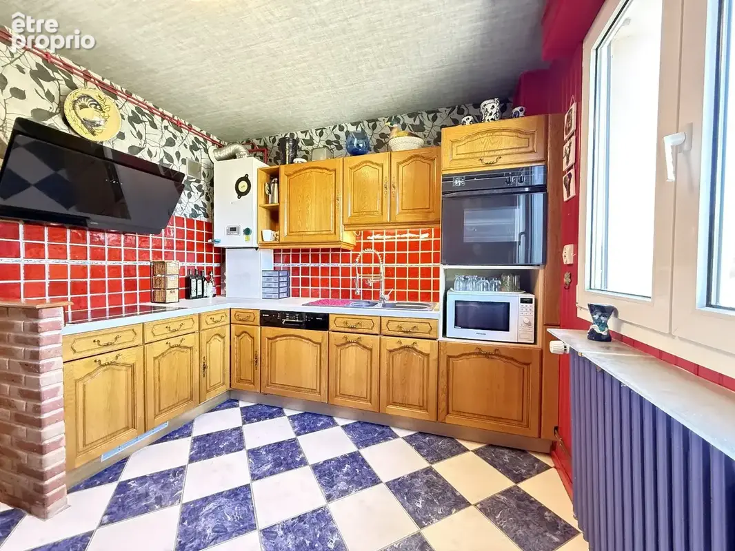 Appartement 4 pièces 92 m² à vendre à Belfort (90000) - photo 2