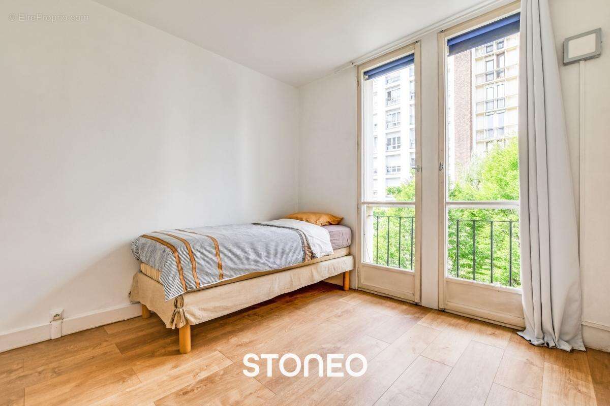 Appartement 4 pieces - 2 chambres - sans vis a vis au calme sur jardins - photo 7