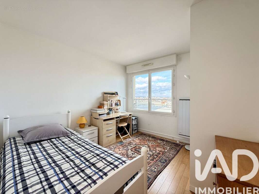 Photo 9 - Appartement à COURBEVOIE
