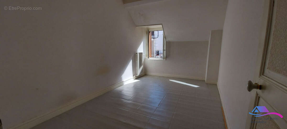 Chambre - Maison à CHATEAUMEILLANT