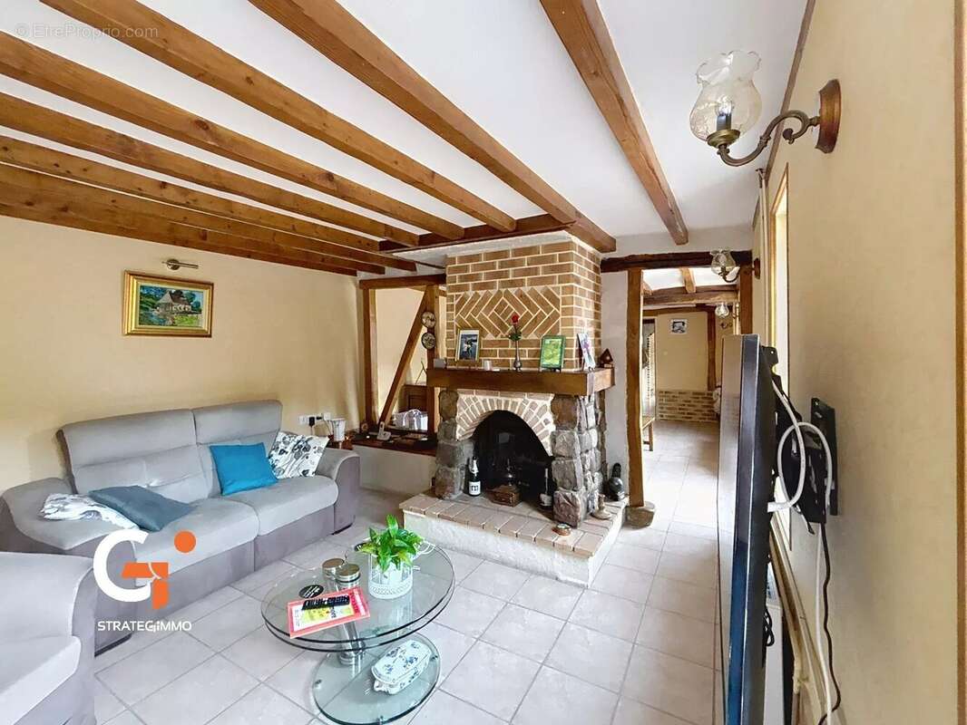 Maison à SAINT-OUEN-DE-THOUBERVILLE