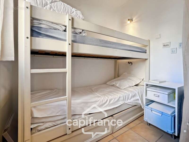 appartement REZ de JARDIN,résidence du lac, 31 m2, chambre ouverte, grande salle de douche, rangements, cave collective - photo 19