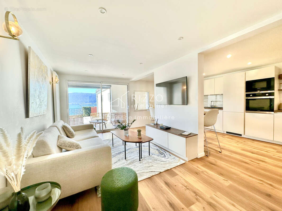 Appartement refait à neuf avec grande terrasse vue lac !!! - photo 11
