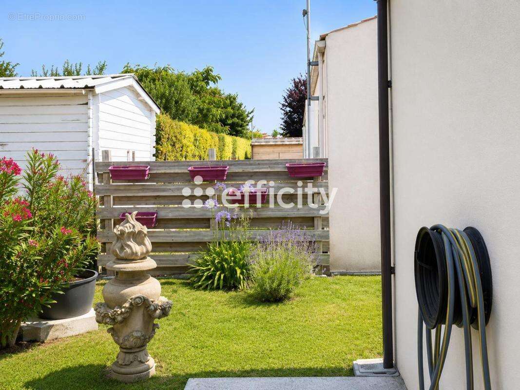 Maison 108 m² à Semussac  - photo 21