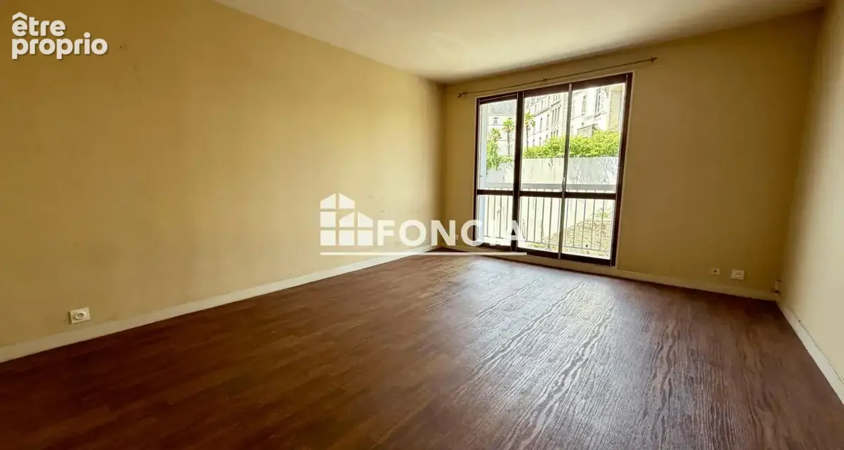 Centre-ville, Appartement T3 de 63 m² avec balcon, cave et parking privatif - photo 3