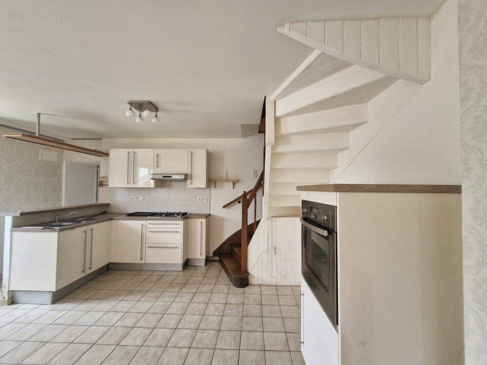 Maison à HENANBIHEN